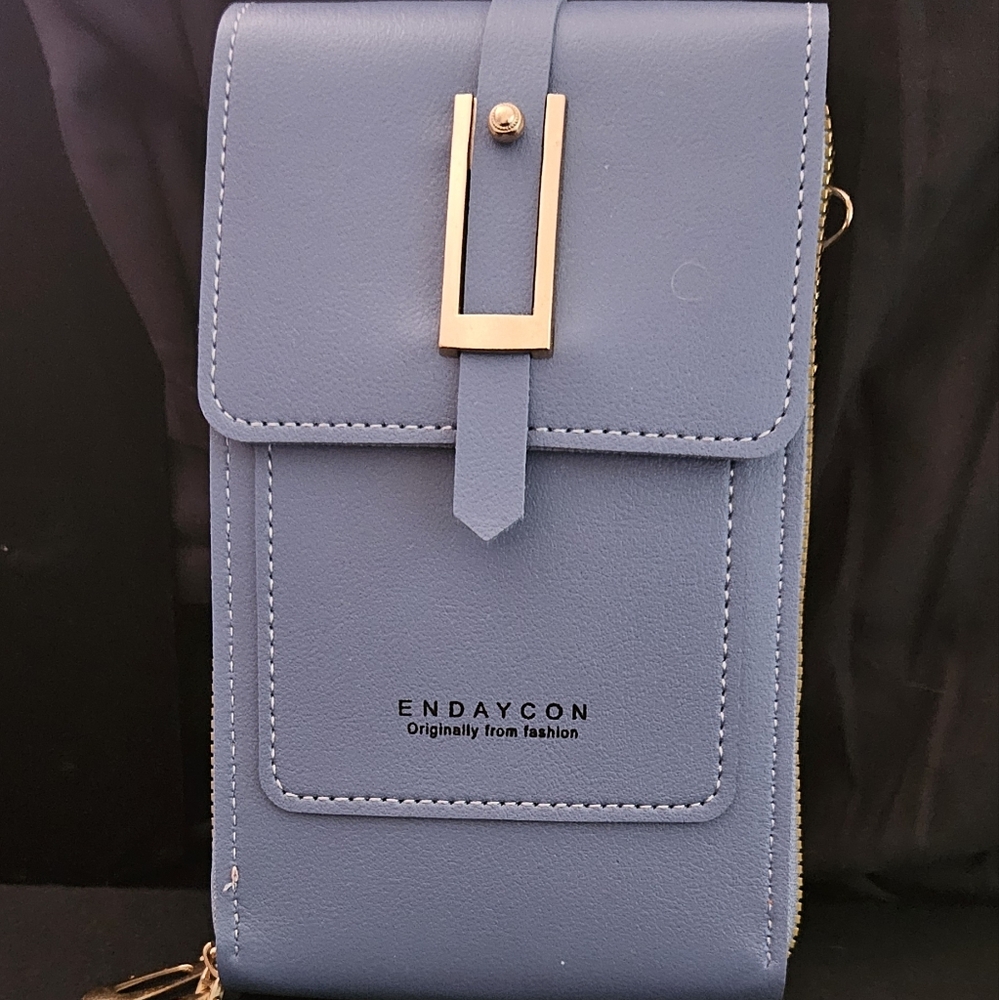 Blue crossbody bag, just the essentials.